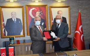 BAŞKAN POSBIYIK’TAN MHP’YE İADE-İ ZİYARET