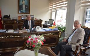 BAŞKAN POSBIYIK, KAYMAKAM ÇORUMLUOĞLU’NU ZİYARET ETTİ